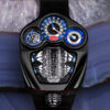 ジェイコブよりブガッティ・トゥールビヨンとのコラボによる腕時計が発表。実際に動作するV16エンジンを内蔵し、ブガッティとともに18ヶ月かけ開発される